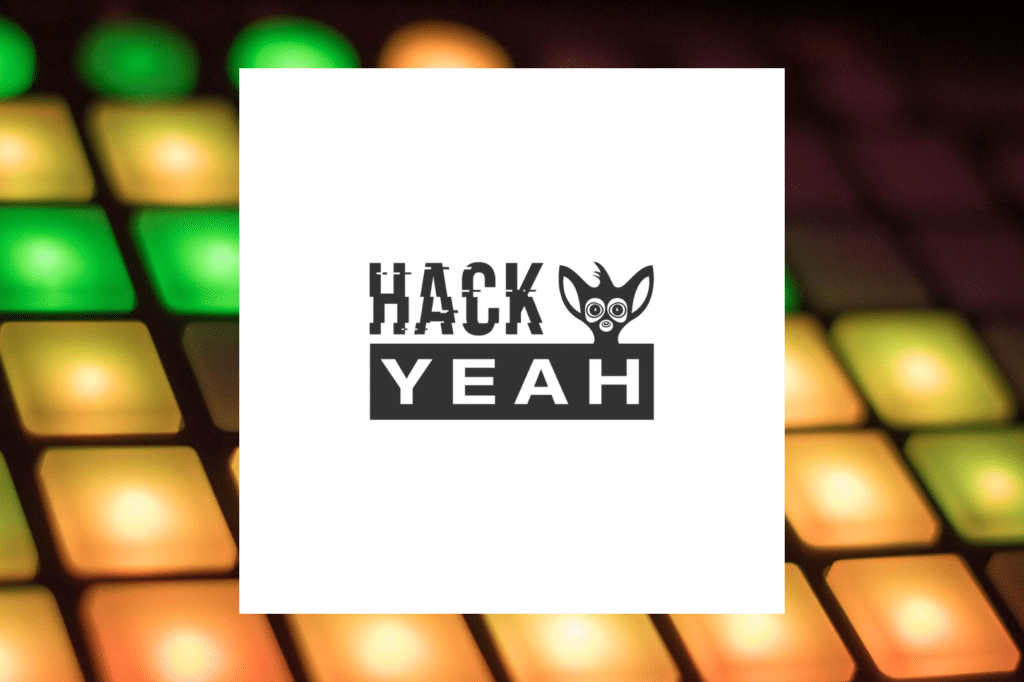 Logo HackYeah na tle kolorowych podświetlonych przycisków.